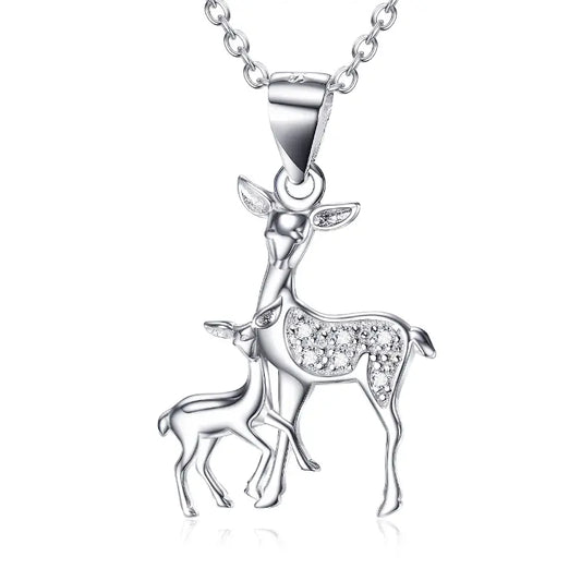 Silver deer pendant featuring a mother and fawn, adorned with sparkling stones, suspended from a delicate chain.